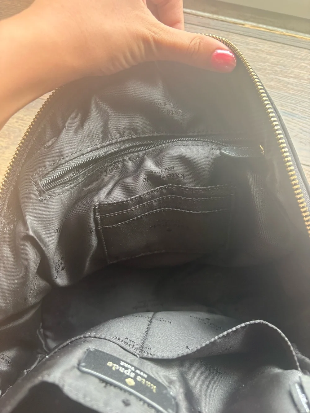 kate spade black nylon backpack with gold-tone hardware